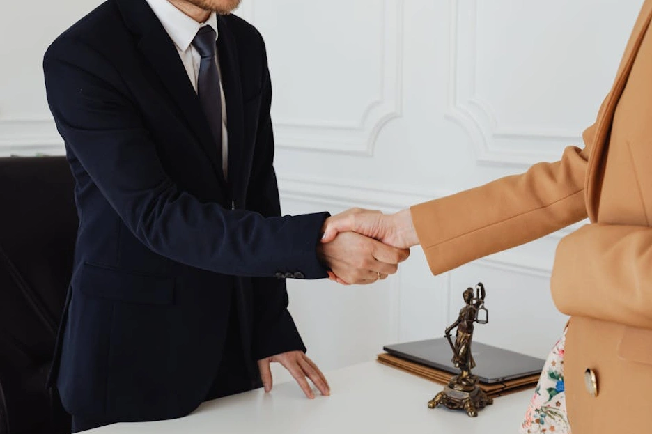 A team of compliance experts in a modern Geneva office discussing strategy.